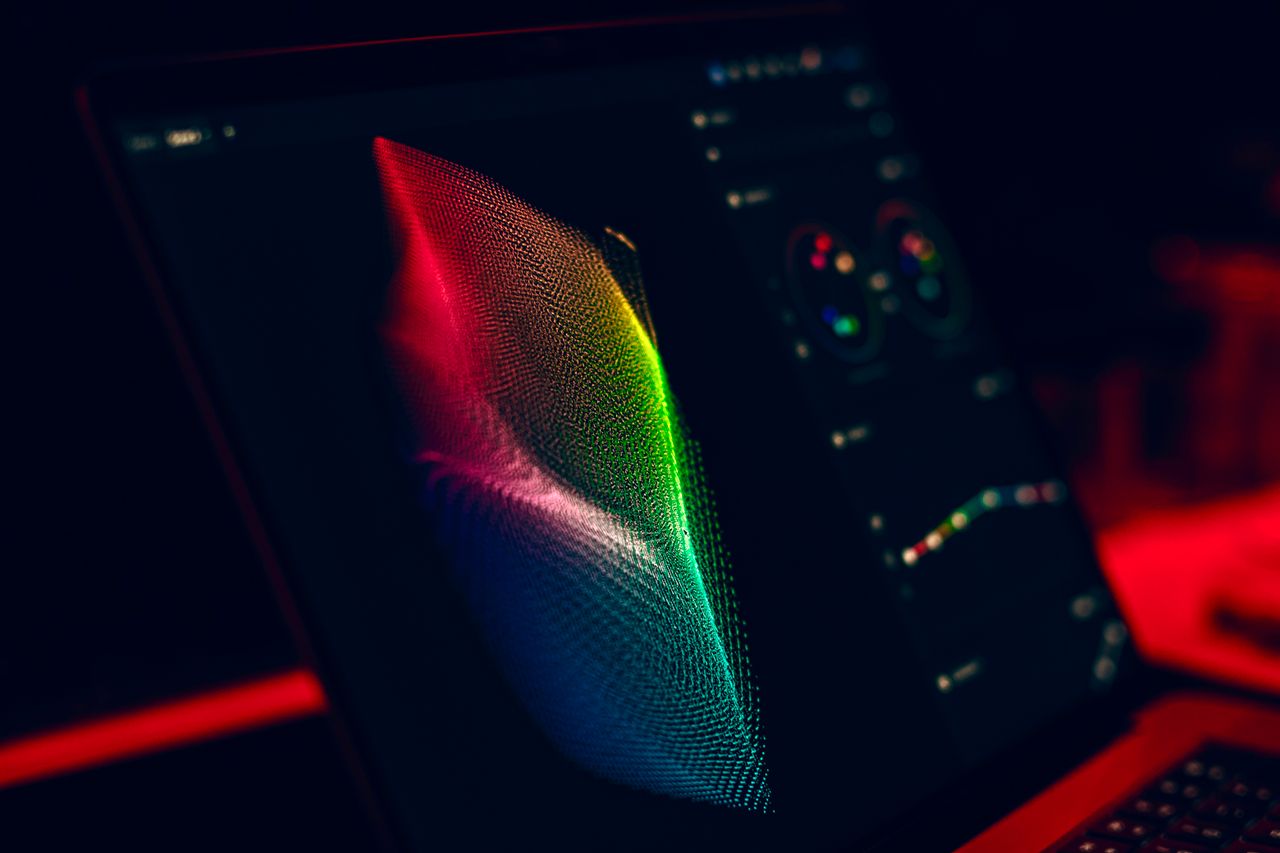 Projects Close-up of vibrant digital art in red, green, and blue displayed on a monitor screen.